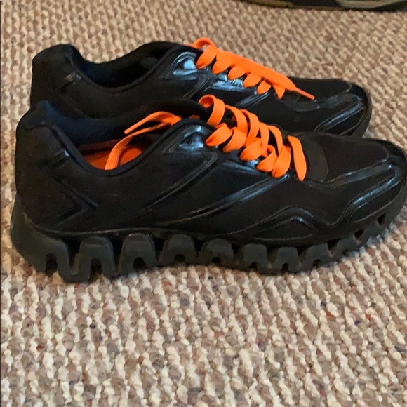 Reebok Shoes Reebok Zigtech Size 3 Black With Orange Laces Poshmark